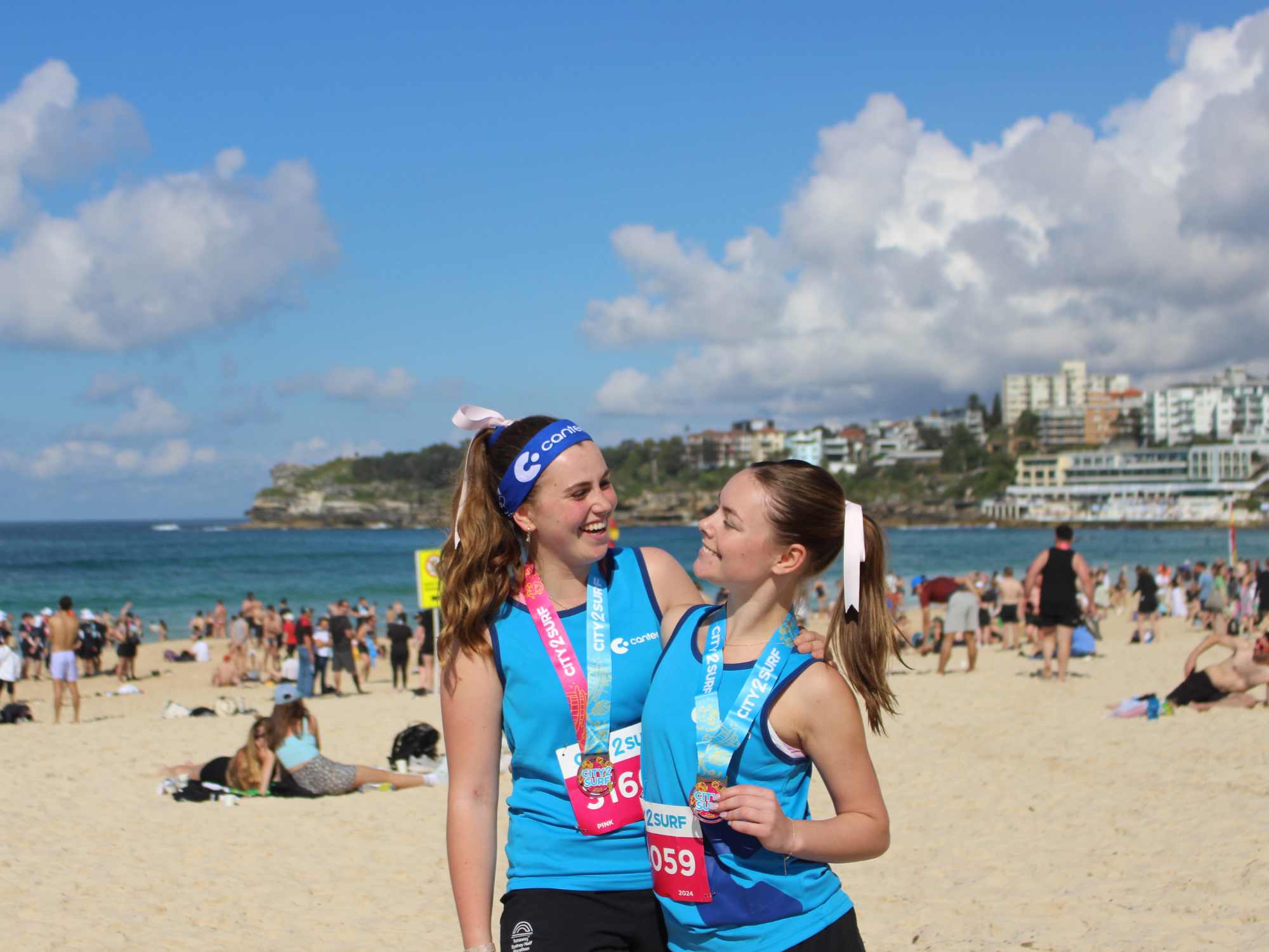 volunteer with canteen at the city to surf